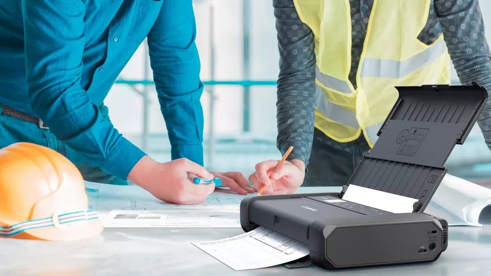 portable canon printer in use on building site