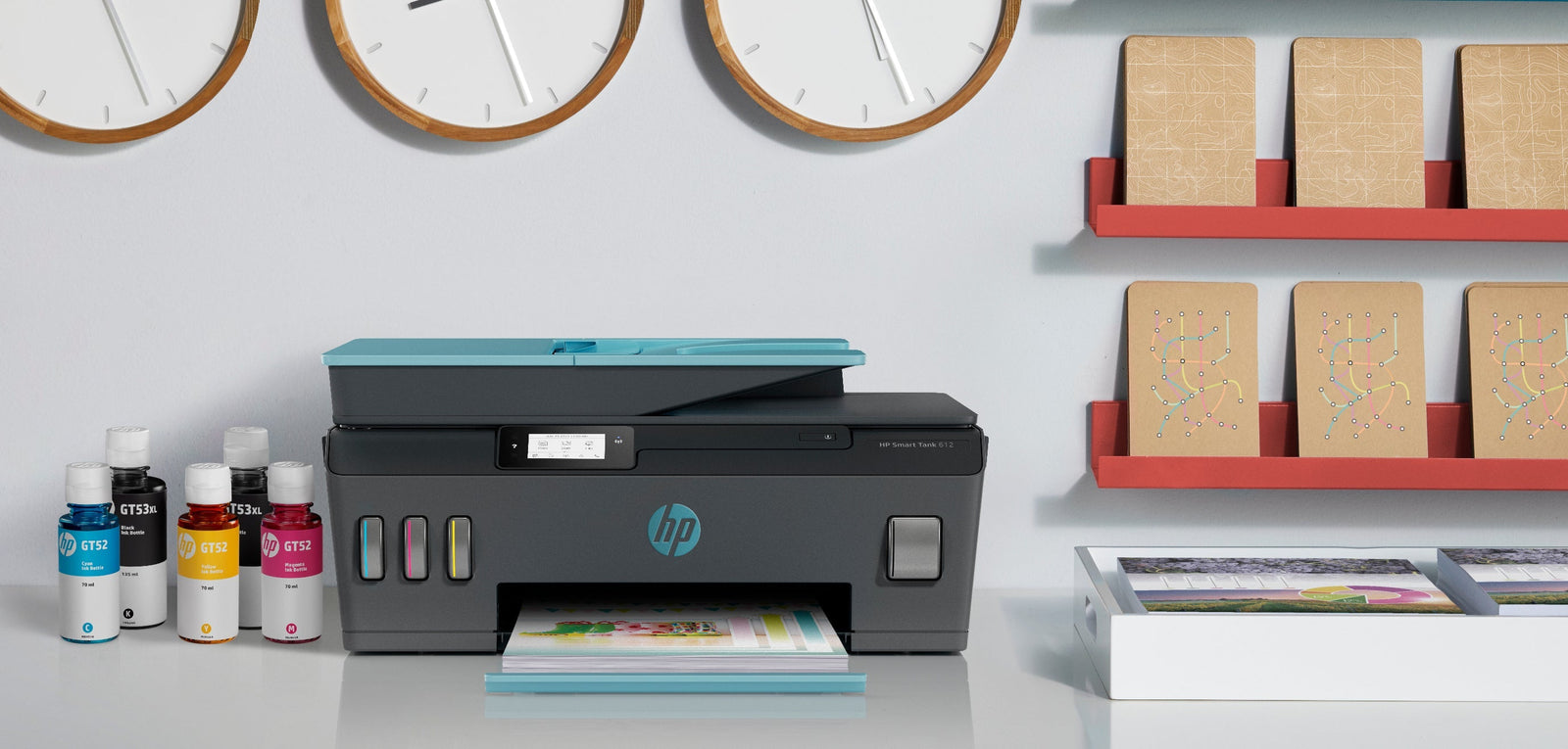 small business printer and ink bottles