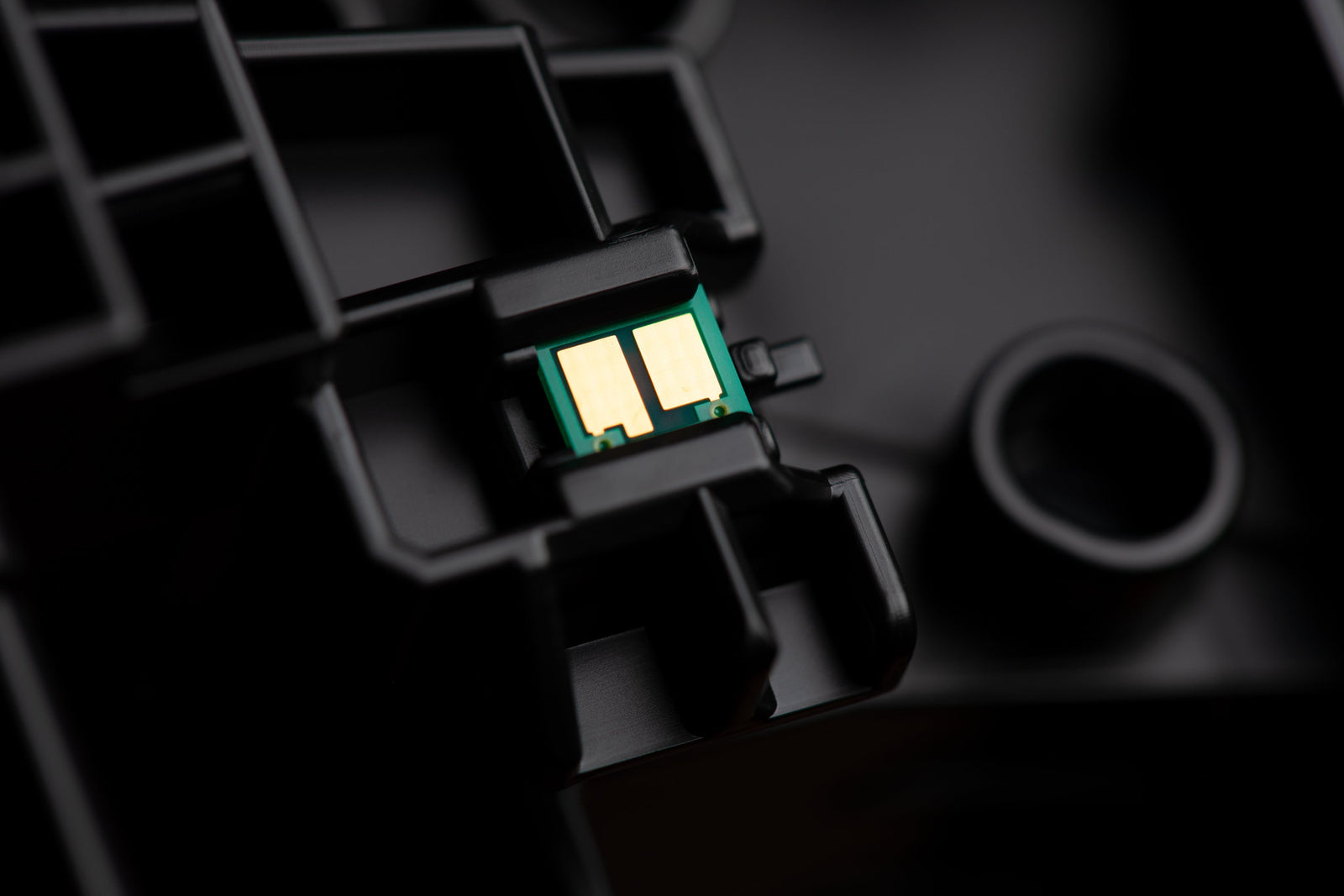 a close up shot of an inkjet printer part