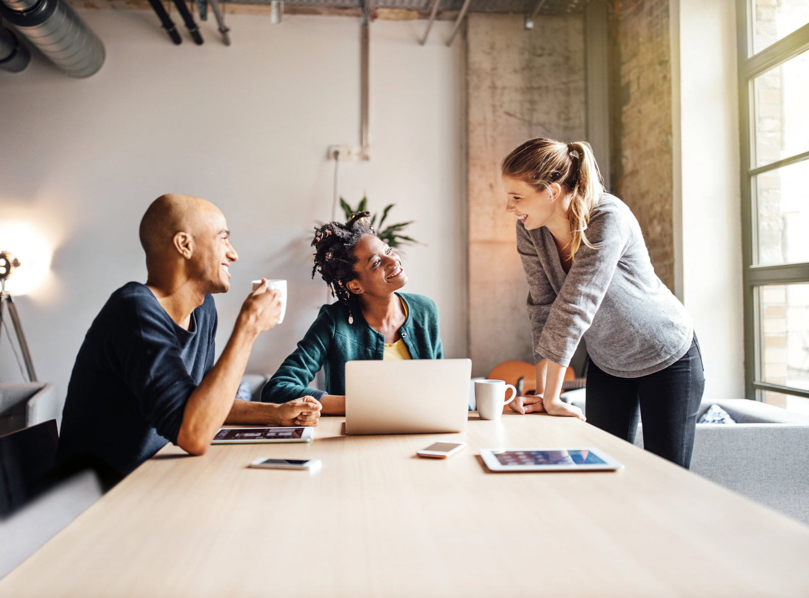 office workers discuss whether to buy genuine or third party inks