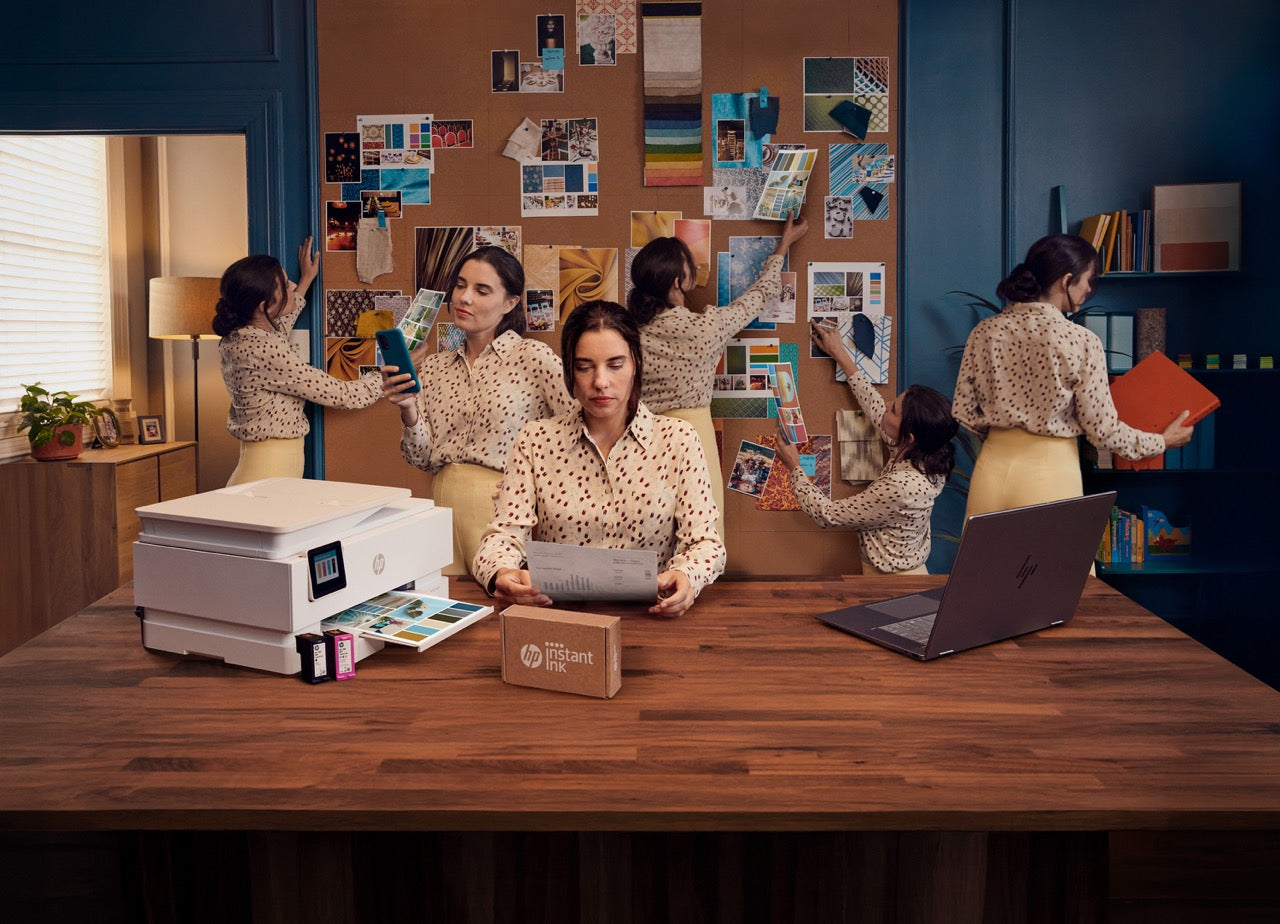 a busy woman in her home office