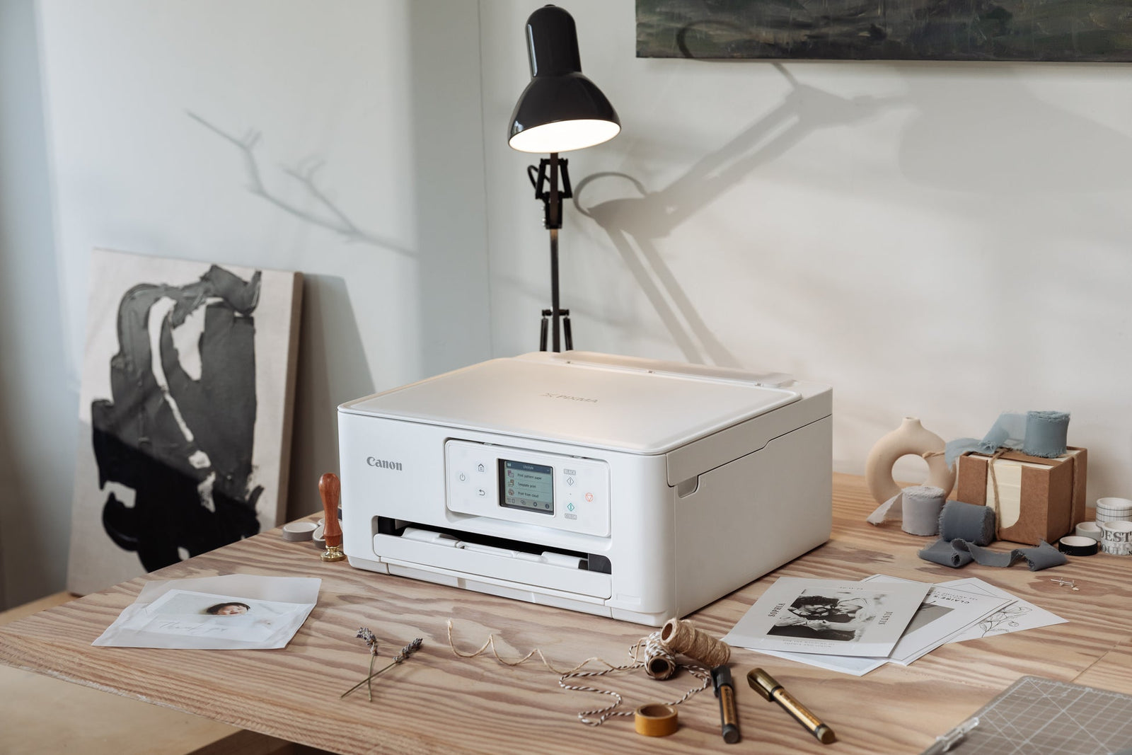 a home printers surrounded by stationary